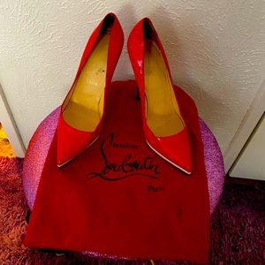 Red bottom heels by Christian Louboutin Paris